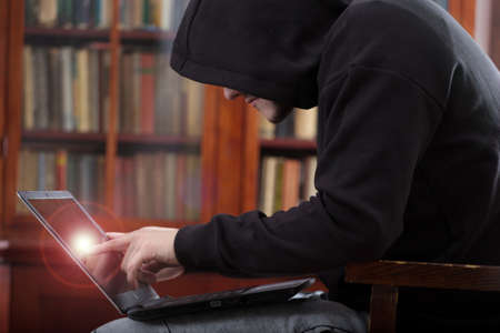Hacker stealing password and identity, computer crime