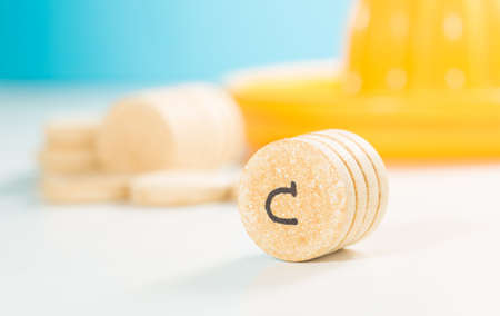 Flu prevention vitamin C pills  on white backgroundの写真素材