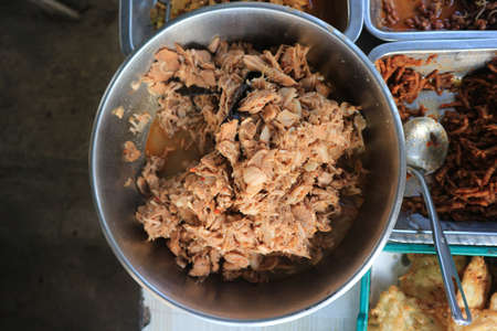 Fried pork with chili sauce at street food,Thailand.