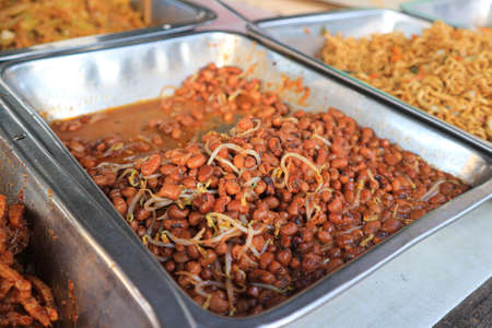 Fried bean with peanut in thai street food market, Thailand.の写真素材