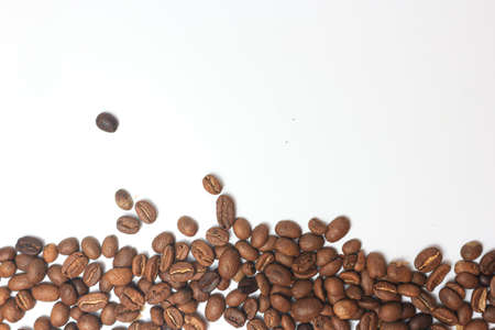 Coffee beans isolated on white background with copy space for text.の写真素材