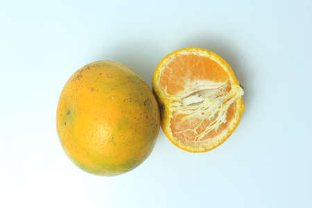 fresh indonesian orange isolated on white backgroundの写真素材