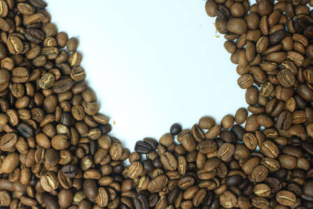Coffee beans on a white background with space for text.の写真素材