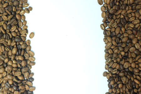 Coffee beans on white background with copy space for text.の写真素材