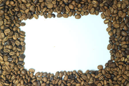 Coffee beans on white background with copy space for text.の写真素材