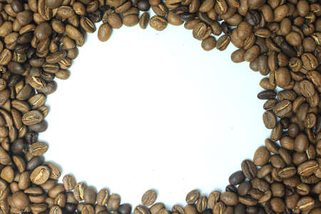 Coffee beans on a white background with space for text.の写真素材