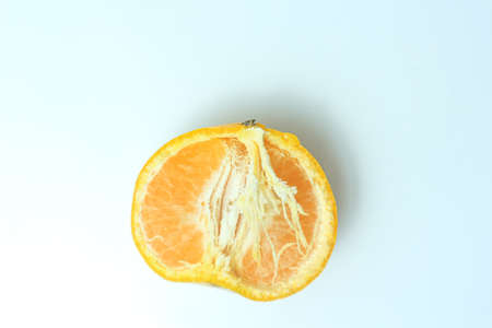 Ripe tangerine on a white background. Close-up.の写真素材