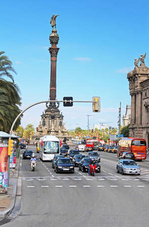 Traffic near Columbus monument in Barcelona, Spain  Columbus Monument is 60 m  It is located at...
