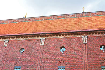 Roof and windows of the building of a City Hall, Stockholm, Swedenの写真素材