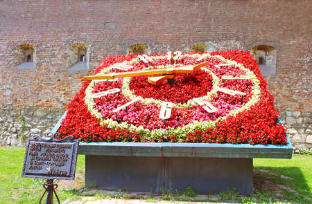 Flower clock under the wall of the Bernardine monastery Lviv, Ukraine. Flower clock was established by Kyivstar companyのeditorial素材