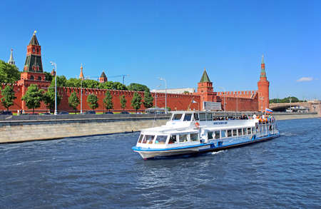 Pleasure boat with tourists near Kremlin, Moscow, Russiaのeditorial素材