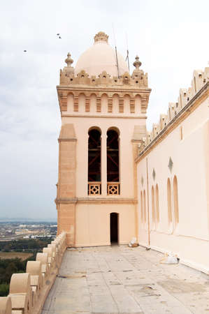 Tower and dome of Cathedral of Saint Louis of Carthage located in Carthage, Tunisia. It is an old Roman Catholic Cathedral situated near the Carthage National Museum on the hill of Byrsaのeditorial素材