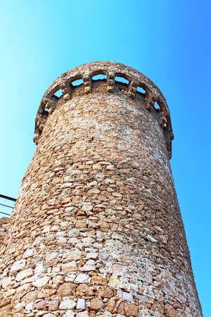 Tower of old castle and view of Tossa de Mar village, Spainのeditorial素材