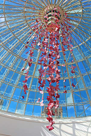 Ceiling with a lot of butterflies, "Globus" shopping mall on Maidan Nezalezhnosti, the centre of Kyiv, Ukraine. With selling space in excess of impressive 21,600 square meters, the Globus center consists of numerous storesのeditorial素材