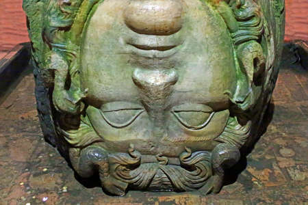 Marble Medusa head sculpture used as a column base in the Basilica Cistern (Yerebatan Sarnici), Istanbul Turkeyのeditorial素材