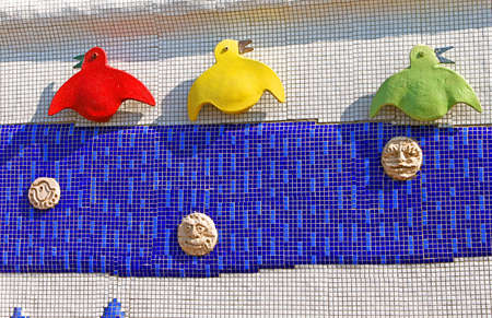 Sculptured panel of colorful crows by the sculptor Constantin Skretutsky at Pejzazhna alley, the famous children's park in Kyiv, Ukraineのeditorial素材