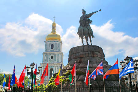 Hetman Bogdan Khmelnitsky statue and flags on Sofievska Square in Kyiv, Ukraine