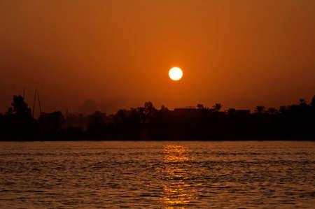Sunset on the river Nile in Egypt, Africaの写真素材