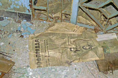 Old communist newspaper in abandoned building in school in Chernobyl Zone. Chornobyl Disasterのeditorial素材