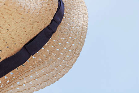 Straw hat on the sky backgroundの写真素材