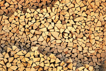 Folded firewood. Background