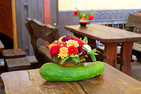 Beautiful autumn compositions with squash and flowers in the pot. Table setting for any event. Handmade decorationの写真素材