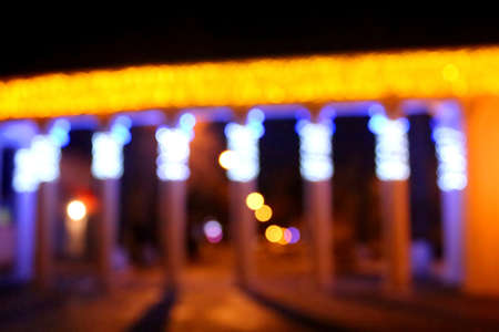 Bokeh of entrance to Gorkyi park with New year decorations, Vinnytsia, Ukraine