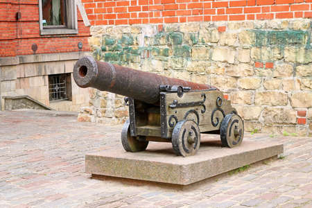 Old massive iron cannon in the Old town of Riga, Latvia