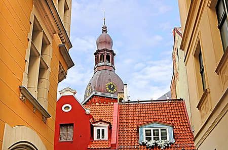 View from Kramu Street to the old buildings and top view of Riga cathedral, Old Town, Riga, Latviaの写真素材