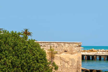 Embankment and pier in the Mediterranean Sea in Carthage, Tunisiaの写真素材