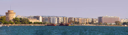Panoramic view of white tower and seaside promenade in the evening in Thessaloniki, Greeceのeditorial素材