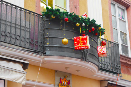 Colmar, France - December 21, 2023: Decorated facade of old building. Old city. Christmas timeのeditorial素材