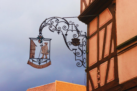 Colmar, France - December 21, 2023: Buildings and signboard in the old townのeditorial素材