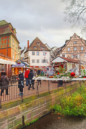 Colmar, France - December 21, 2023: Channel and Christmas decoration.  Christmas timeのeditorial素材