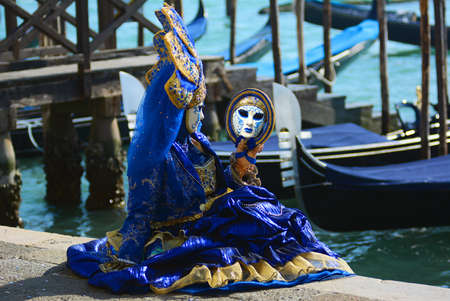 bright and beautiful costumes and masks at the carnival in Veniceのeditorial素材