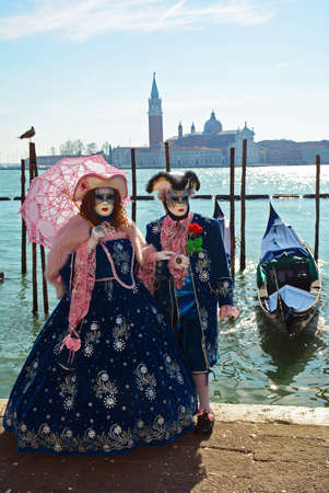 bright and beautiful costumes and masks at the carnival in Veniceのeditorial素材