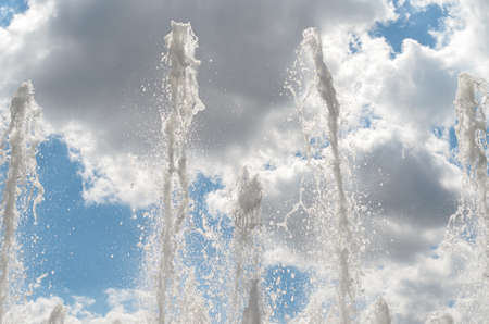The jets of the fountain-like branches of the trees and break simultaneously.の写真素材