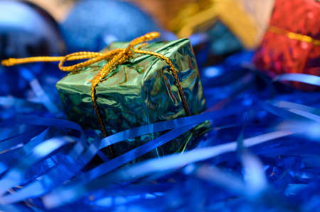 Christmas and New Year gifts in the form of gift boxes and fir-tree toys.の写真素材