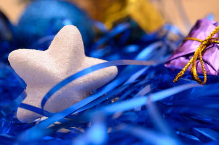 Christmas and New Year gifts in the form of gift boxes and fir-tree toys.の写真素材