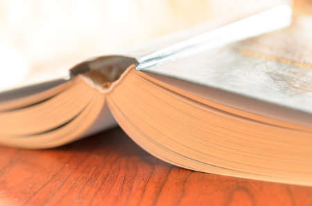 A stack of books on the table.の写真素材