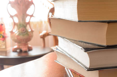 A stack of books on the table.の写真素材