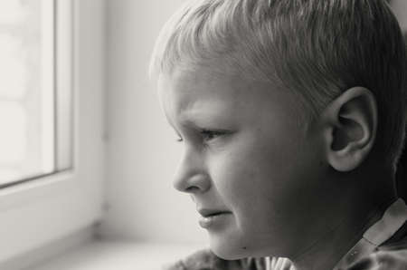 Missing child. Abandoned toy. Loneliness. Black and white image.の写真素材