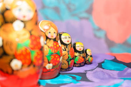 Russian matryoshkas on a light background and a colored background.の写真素材