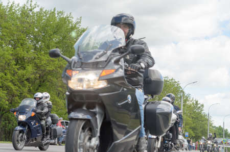 Brest, Belarus - May 27, 2017: Bikers on their motorcycles in special clothes ride a collar on the outskirts of the city of Brest at the annual international festival of bikers on May 27.のeditorial素材