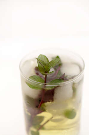 Kentucky derby drink in a glass goblet on a light background.の写真素材