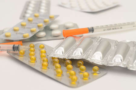 Contraceptive tablets in packages and without on a light background. Preparations of medical purpose.の写真素材