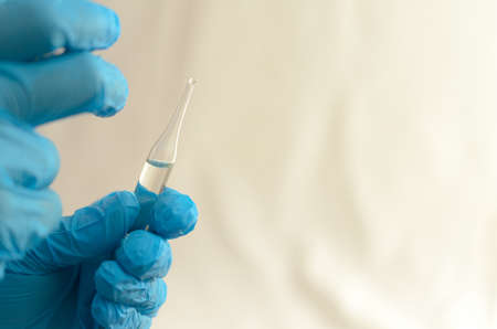 The doctor makes tests with a biological fluid.