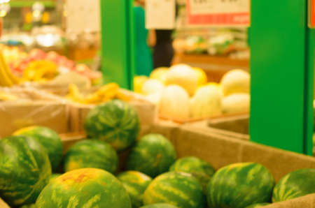 Abstract blur store shelves with fruit for backgroundの写真素材