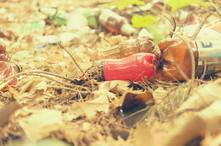 Plastic bottles spoil and pollute the ecological state of natureの写真素材