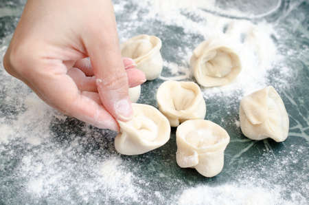 The process of making delicious home-made dumplings with meat